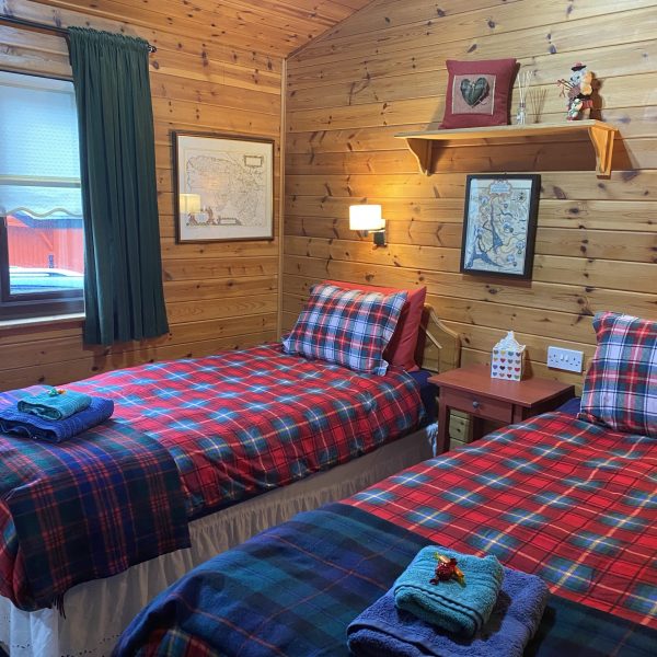 Guest room with two single beds. Loch Lomond, Rowardennan. Loch Lomond Holiday Lodge